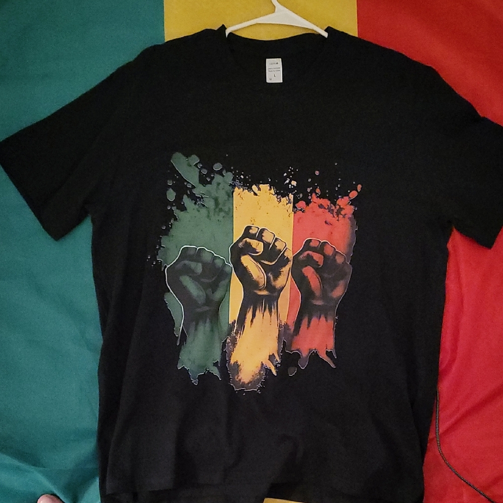 Vibrant Black Graphic Tee with Bold Fist Design